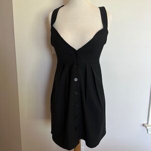 Authentic Theory button down jumper in black. Size 4. Excellent used condition.